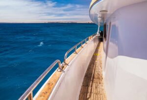 Deck of cruise yachts in clear water near a coral reef. Red Sea, Egypt