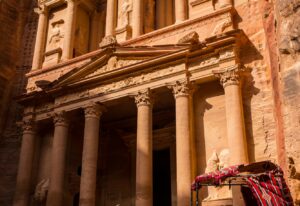 Horse carriage in the front of Treasury. Petra, Jordan. Ancient stone carving