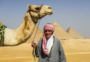 Three pyramids, Cairo, and tour guide
