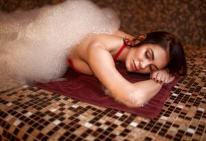 Woman in foam, turkish bath, hamam