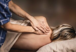 A woman receiving massage in Hurghada in one of our facilities