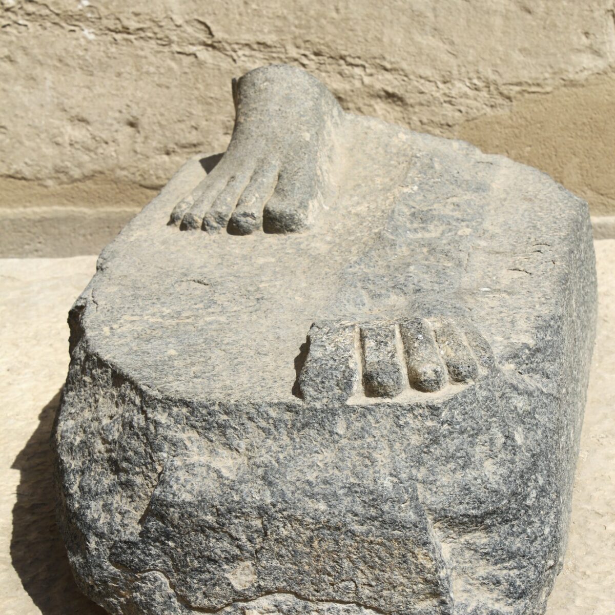 Feet of old statue, Karnak Temple, Luxor, Egypt