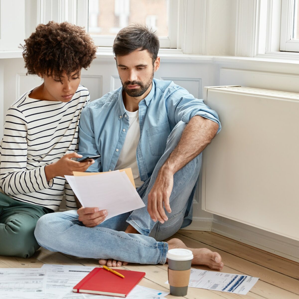 Serious unshaven man expert tries to explain his idea to wife, discuss business development, look at